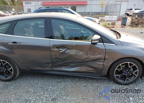 2012 Ford Focus Titanium z USA, uszkodzony, nr VIN 1FAHP3N28CL210557